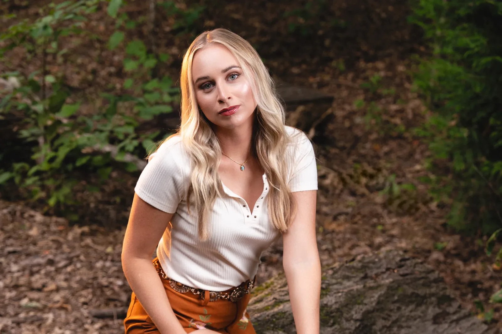 Melanie Dyer photographed among the trees